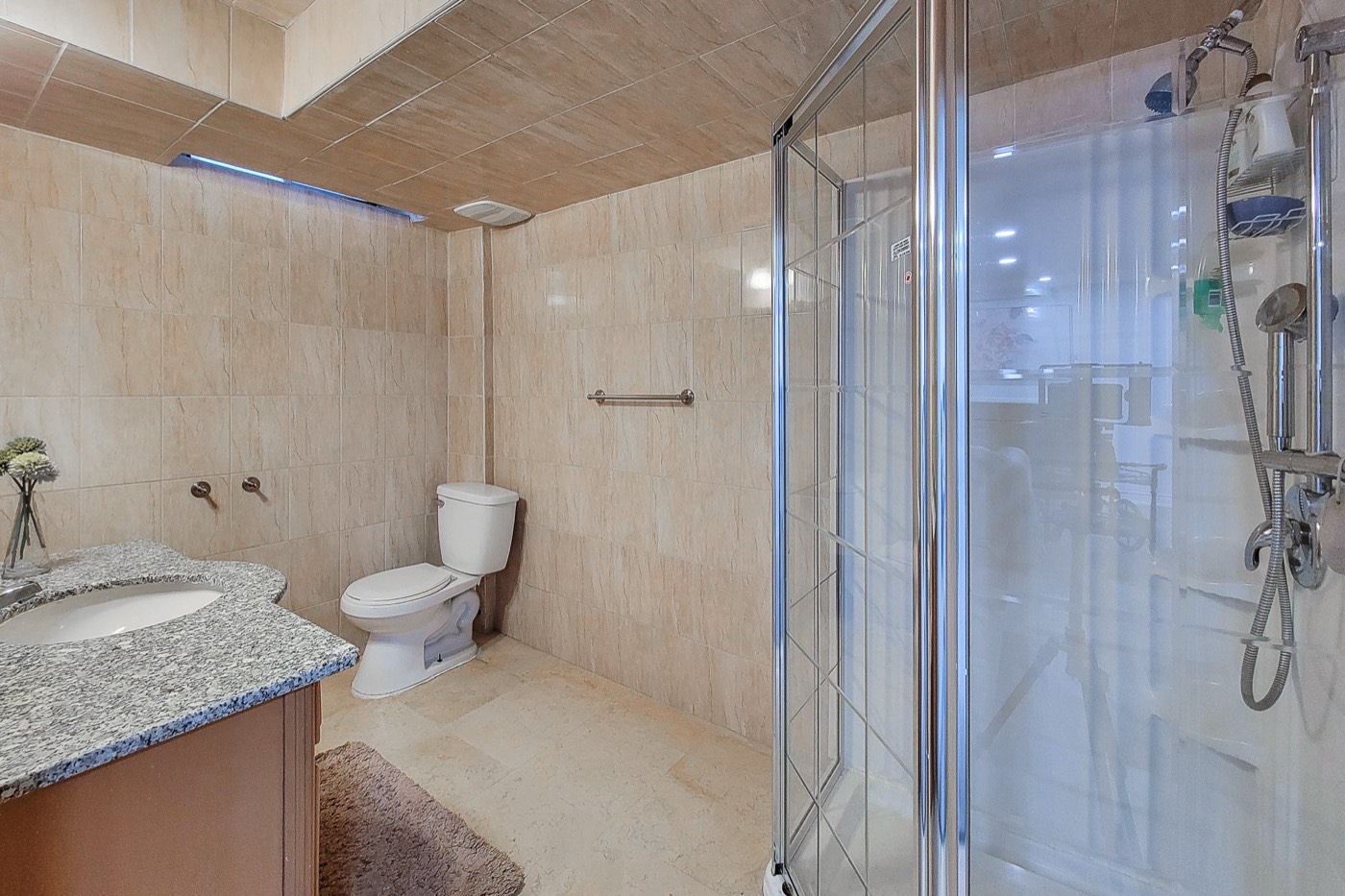 Cleaned bathroom with glass shower enclosure